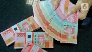 016584500_1672910854-Imbas_potensi_perlambatan_ekonomi_nilai_rupiah_melemah_terhadap_dollar-ANGGA_4