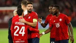032817100_1759289893-Lille_s_Olivier_Giroud__center__and_Lille_s_Calvin_Verdonk