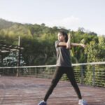 015092300_1758005740-sportswoman-stretching-arms-2