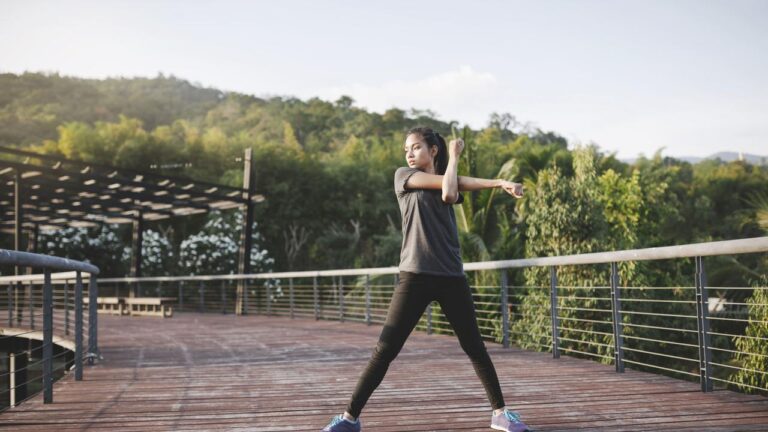 015092300_1758005740-sportswoman-stretching-arms-2